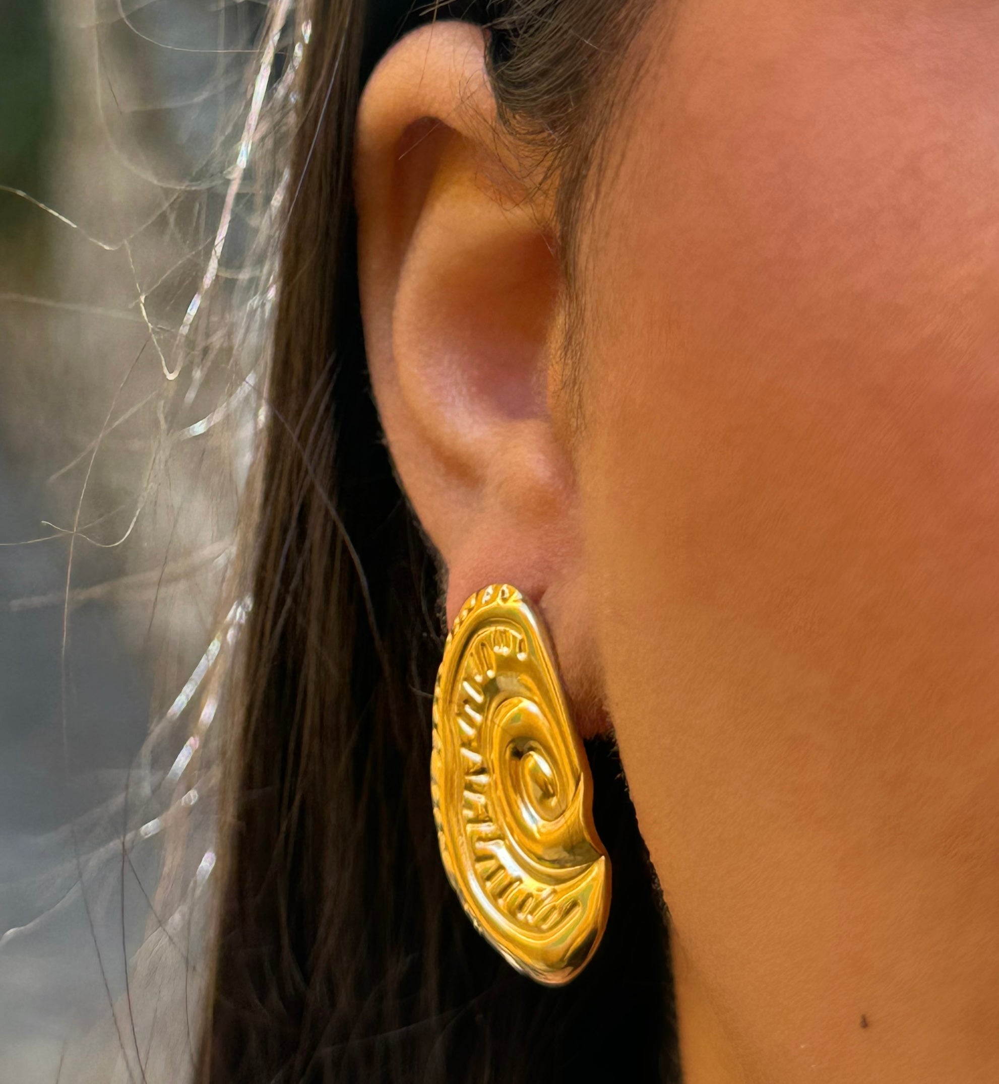 Boucle d’oreille "Asyl"